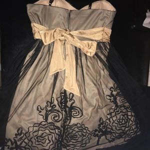 Gold and black dress by A. Byer